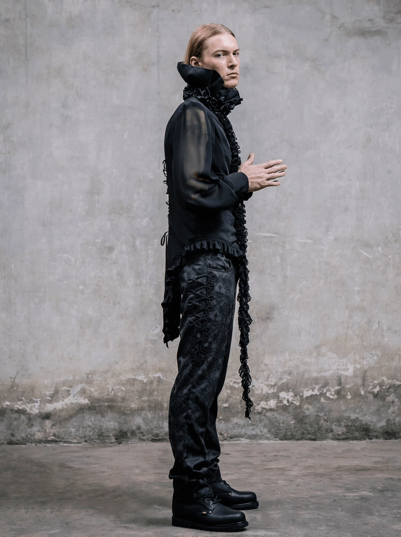 Side detail view black jacquard gothic trousers showing damask pattern and tailored fit construction