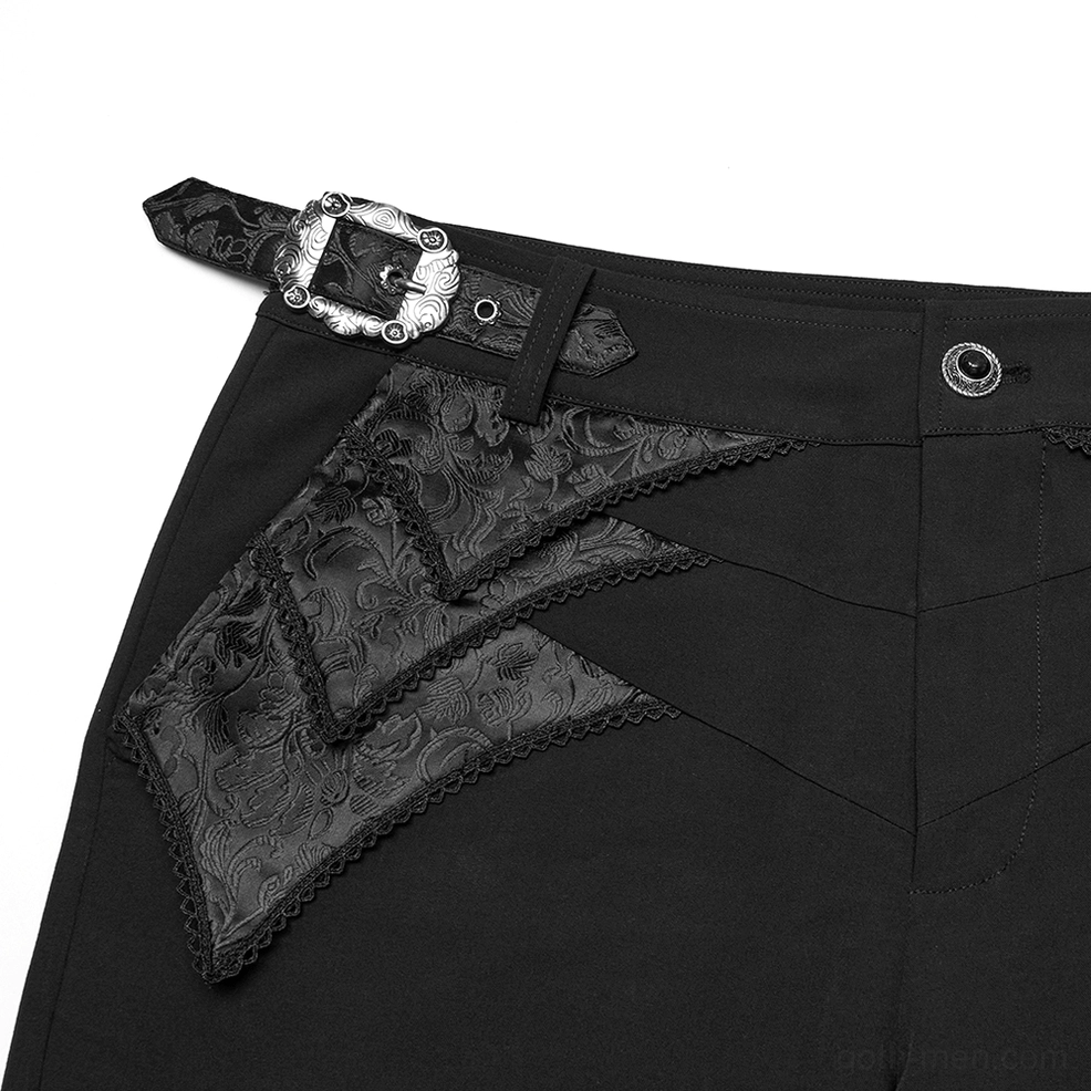 Black jacquard gothic trousers waist detail close-up, featuring vintage metal button, layered lace patches and belt loops