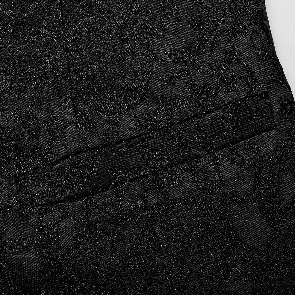 Black jacquard gothic waistcoat 3D dimensional woven texture close-up showing intricate pattern depth