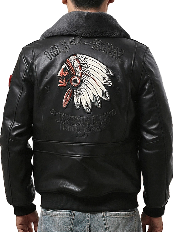 Black sheepskin bomber jacket back view featuring large Indian chief embroidery artwork and military insignias
