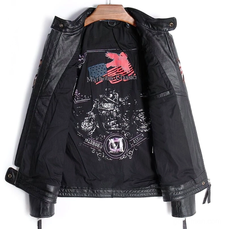 Open black genuine leather gothic jacket flat lay showing cotton lining and adjustable snap cuffs