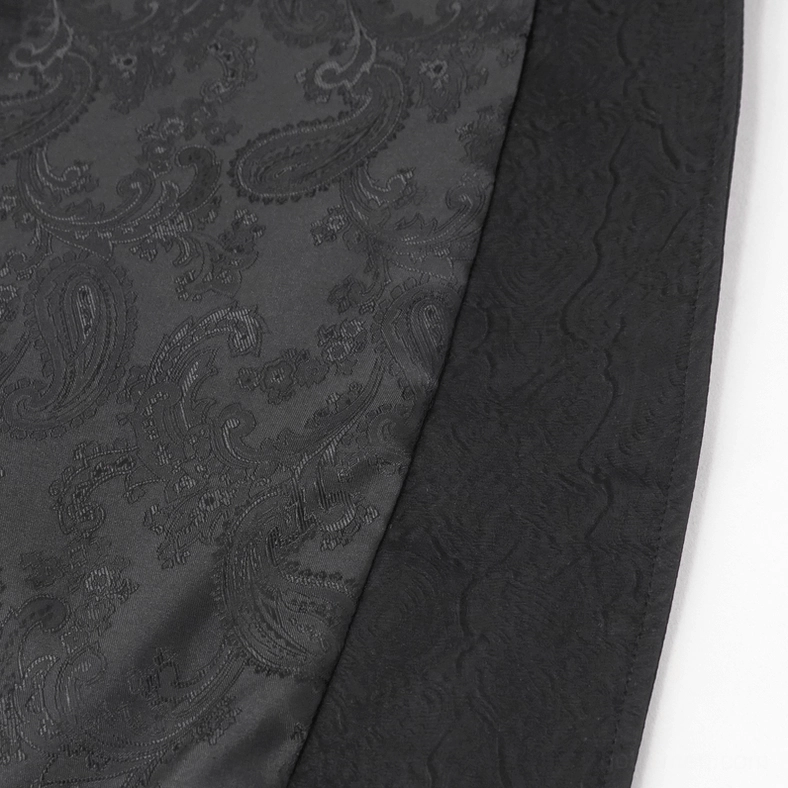 Close-up of embossed paisley damask pattern on black leather gothic coat fabric texture