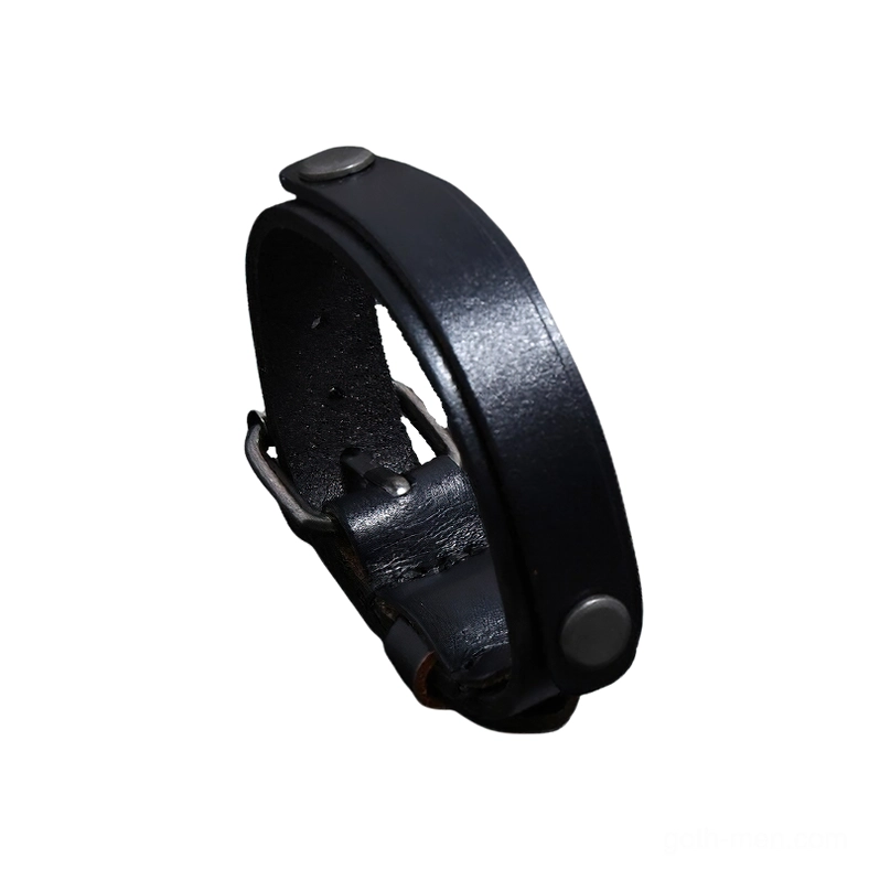 Black genuine leather punk cuff bracelet with antique silver buckle and rivets, side view showing adjustable design