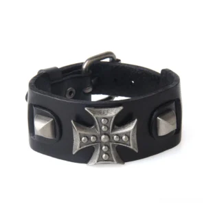 Black genuine leather gothic cross bracelet flat lay front view with silver metal cross and pyramid studs details