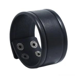 Black wide genuine leather gothic cuff bracelet with industrial snap fasteners, front three-quarter view