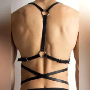 Men's black leather body harness back view with Y-shaped shoulder straps and adjustable waist buckle, alternative fashion design
