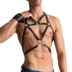 Black leather bondage harness with metal ring design and adjustable straps, front close-up with wrist cuffs