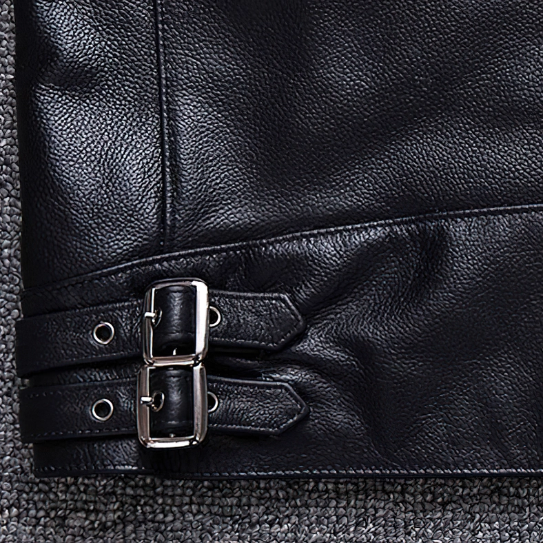 Black leather motorcycle jacket adjustable hem with dual leather buckles and strap detail