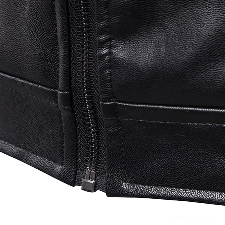 Close-up detail of black gothic leather jacket front zipper and stitched panels