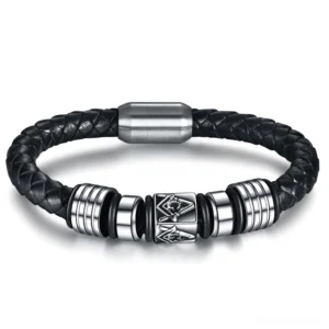 Black leather Masonic bracelet with stainless steel magnetic clasp, top-down flat lay view showing braided leather and engraved Masonic charms