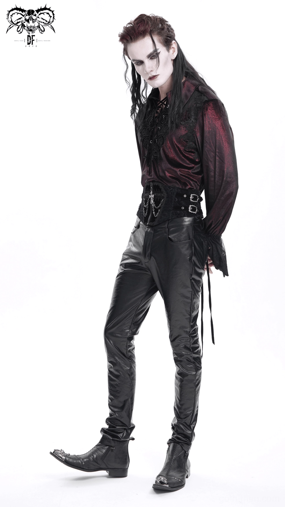 Close-up of black leather pants hem and inseam construction quality stitching detail