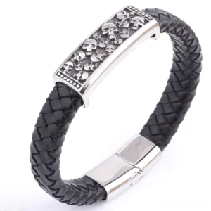 Authentic black leather gothic skull bracelet featuring detailed metal skull plate and silver stainless steel hardware, front angle view