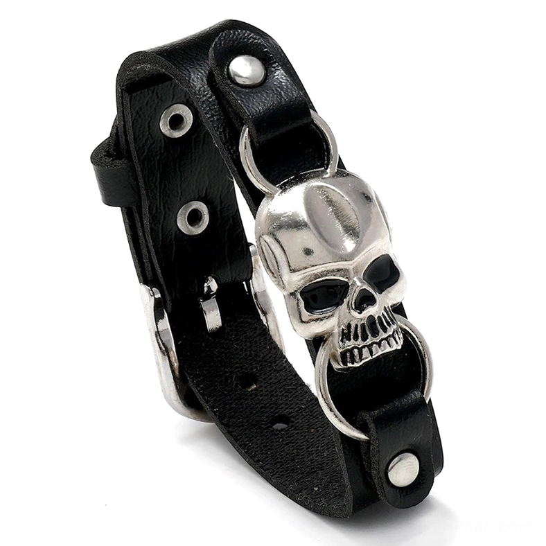 Black leather skull cuff bracelet with antique silver metal hardware, 3/4 close-up view on white background
