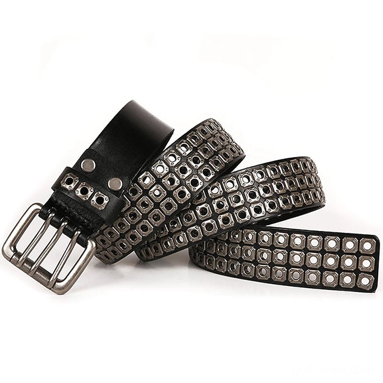 Black studded leather belt flat lay oblique view showing dual grommet strap ends and double-prong buckle