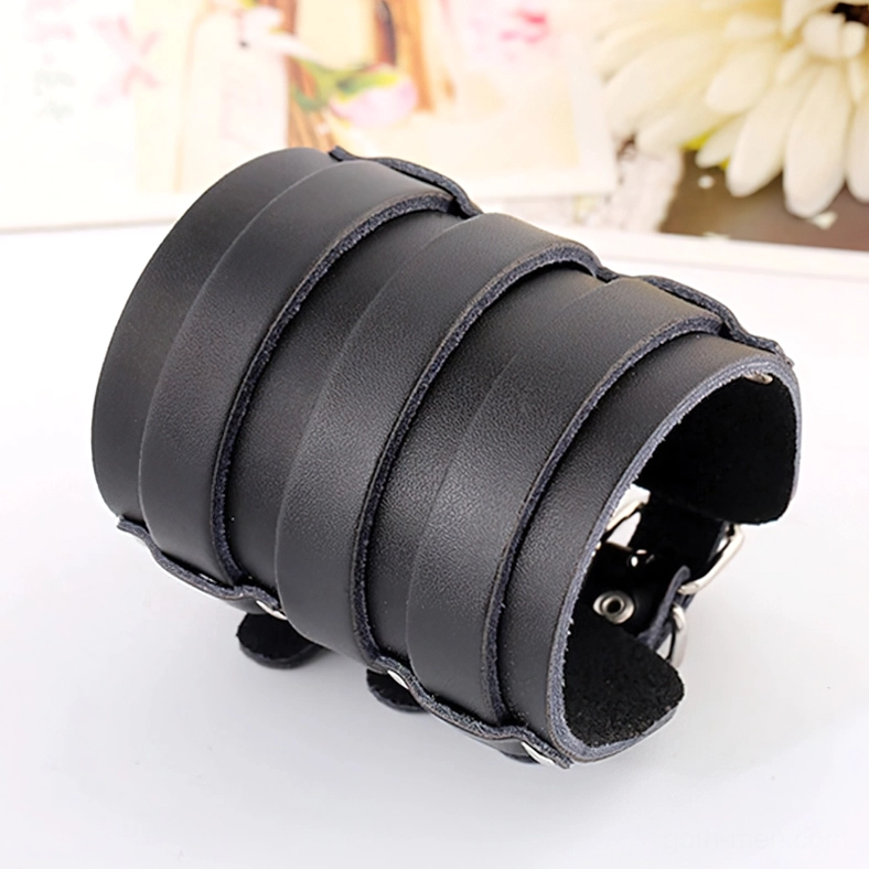 Black matte leather gothic punk cuff bracelet front view showing smooth finish and adjustable strap hardware