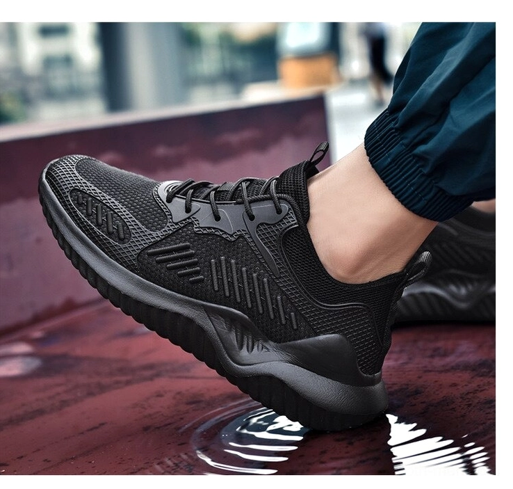 Black mesh gothic sneaker worn on-foot urban street style - casual goth aesthetic