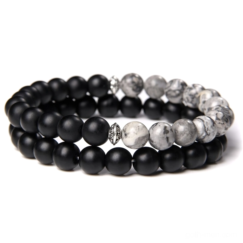 Black onyx and grey mapstone dual-layer beaded gothic bracelet with silver spacers, elastic construction, flat lay overhead view