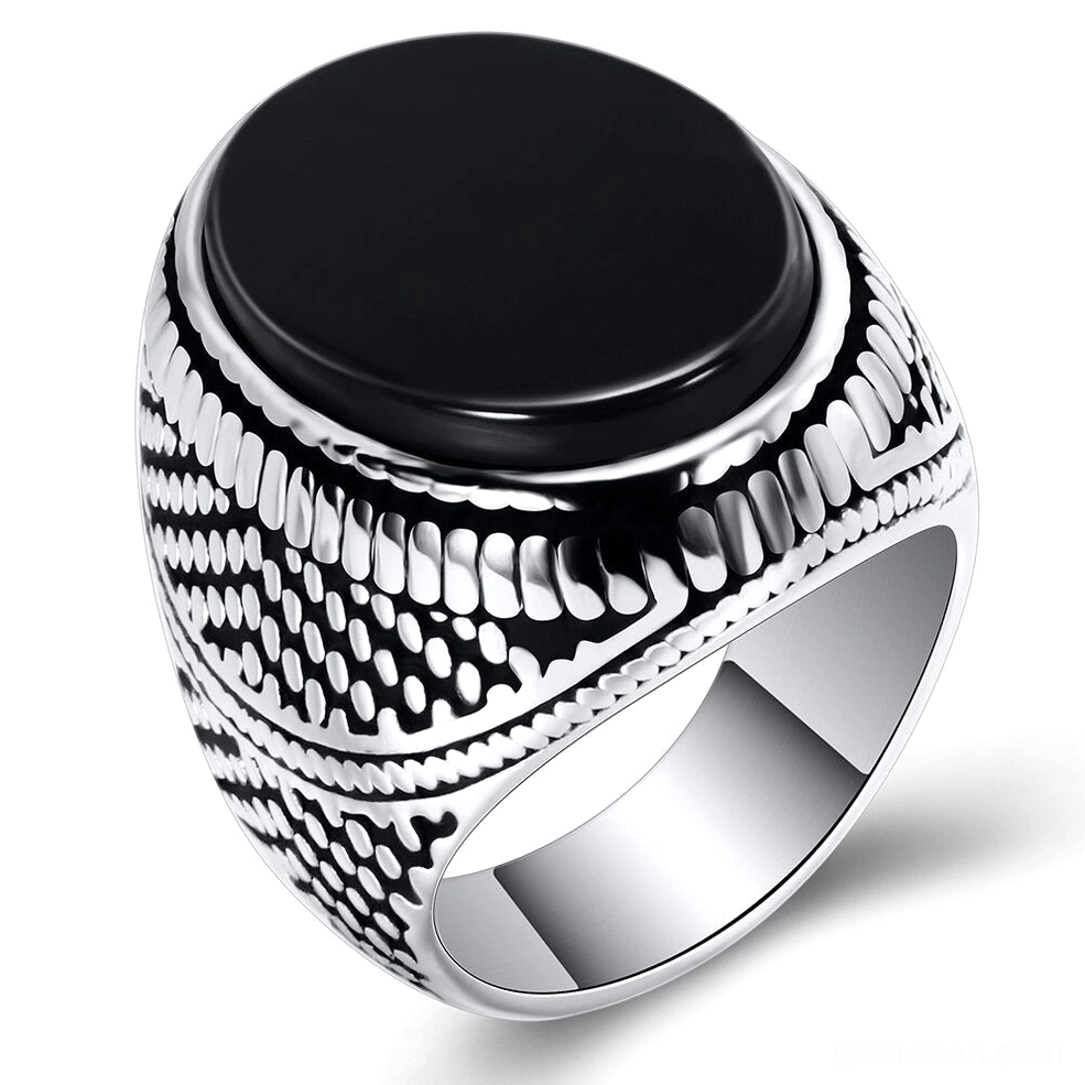Black stone gothic signet ring for men - vintage embossed band pattern, oblique front view on white background