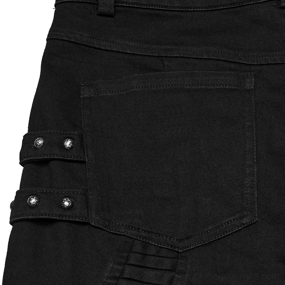Back waist close-up of black techwear pants showing metal rivet patch pocket and durable denim