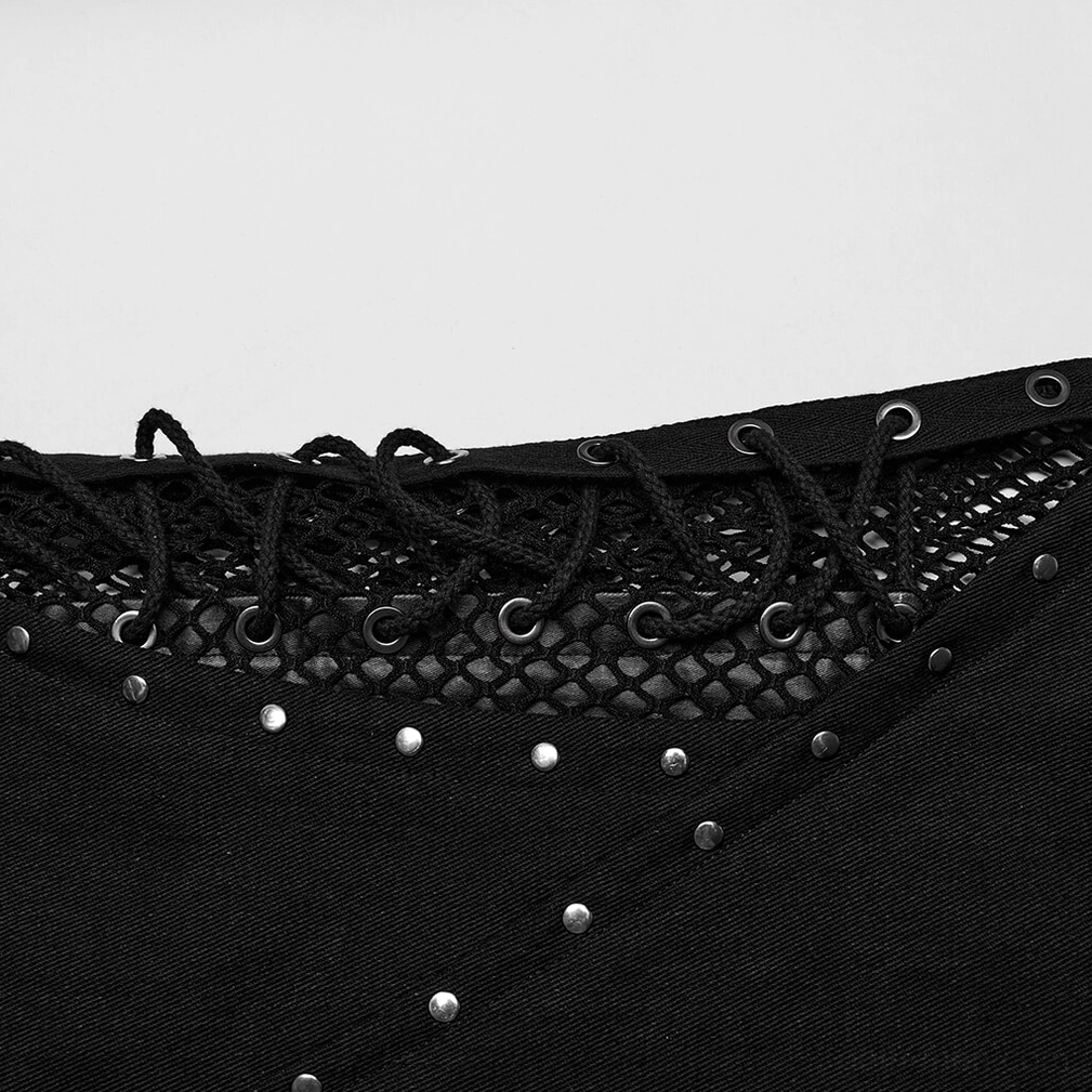 Detailed close-up of lace-up cord and mesh panel with metal rivets on alternative pants