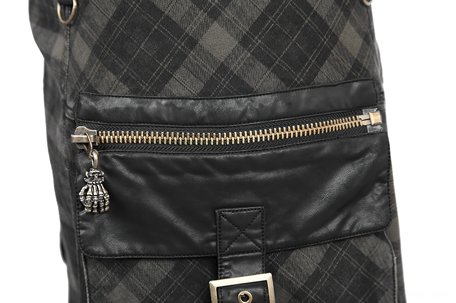 Front quarter view of black plaid kilt emphasizing tartan pattern and structured silhouette