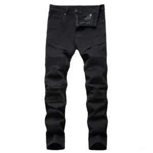 Black gothic pleated biker jeans front flat lay view with structured knee panels and slim straight fit