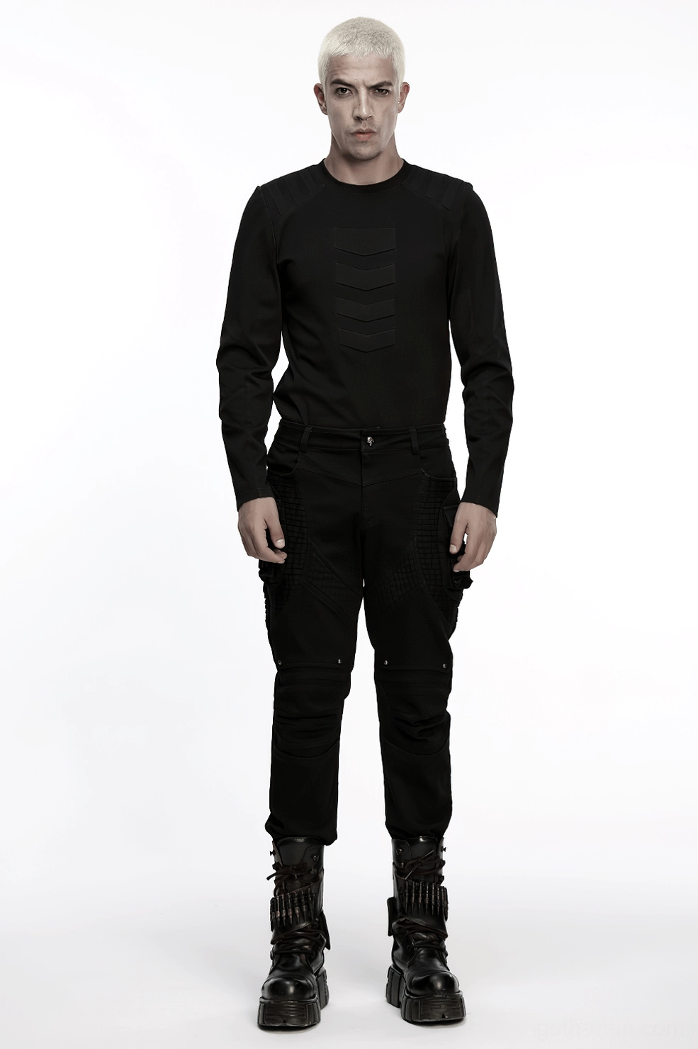 Black pleated pants flat lay showing overall silhouette and architectural pleating structure