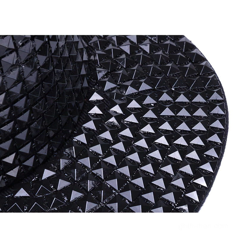 Alternate angle of black pyramid studded cap showing spike arrangement pattern