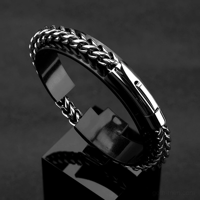 Black and silver two-tone stainless steel gothic bracelet - studio side view with push button clasp
