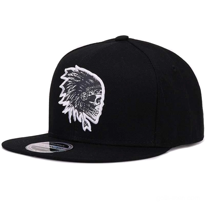 Black cotton snapback cap with white embroidered skull logo, front three-quarter view showing flat brim structure