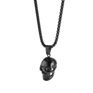 Black stainless steel skull pendant necklace with polished finish and O-chain, front view isolated on white