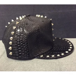 Gothic studded snapback cap showing rear side view with reptile texture and metal hardware details