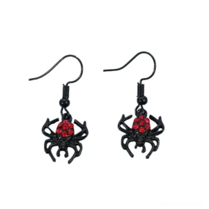 Black spider drop earrings with red rhinestone details, front flat lay view on white background, gothic jewelry showcase