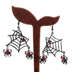 Black spider dangle earrings displayed on jewelry stand, front view showing intricate web design and matte finish
