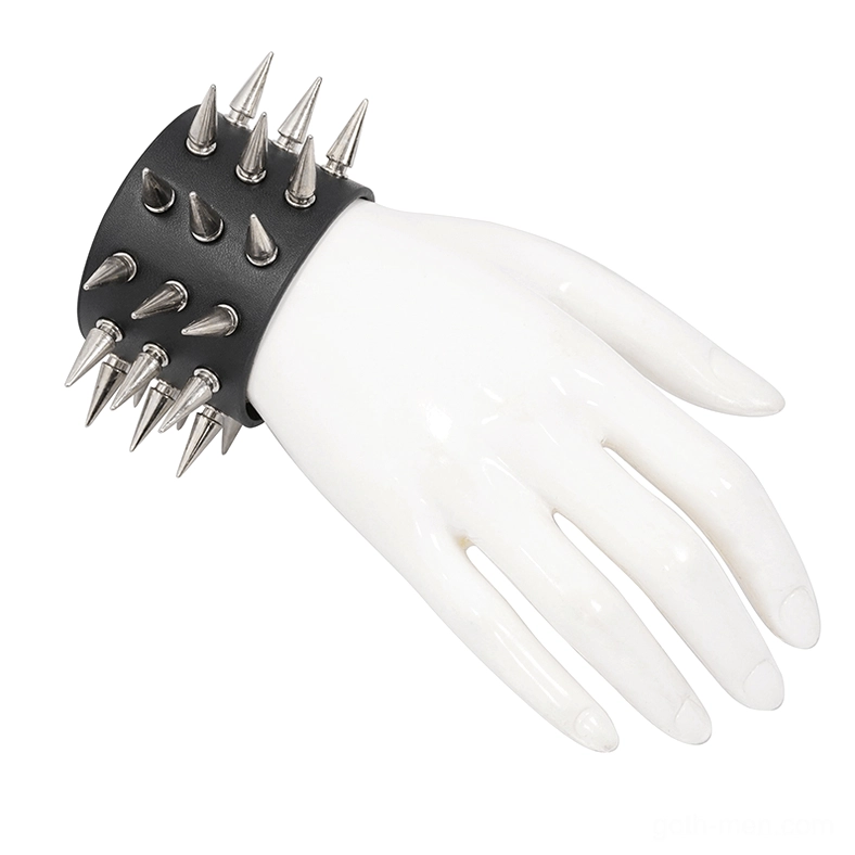 Black leather spiked bracelet on white mannequin hand displaying side profile of spike arrangement