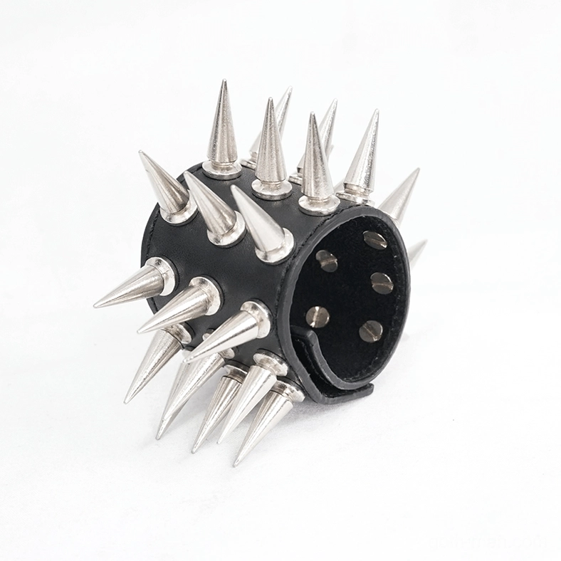 Full black leather spiked bracelet three-quarter view showing dense silver spike coverage on band