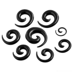 Black spiral acrylic ear stretchers and gauges collection, multiple sizes arranged in flat lay, glossy finish gothic jewelry