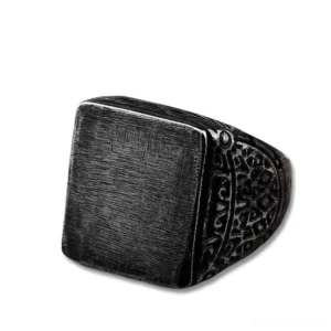 Black square signet gothic biker ring stainless steel flat lay front view