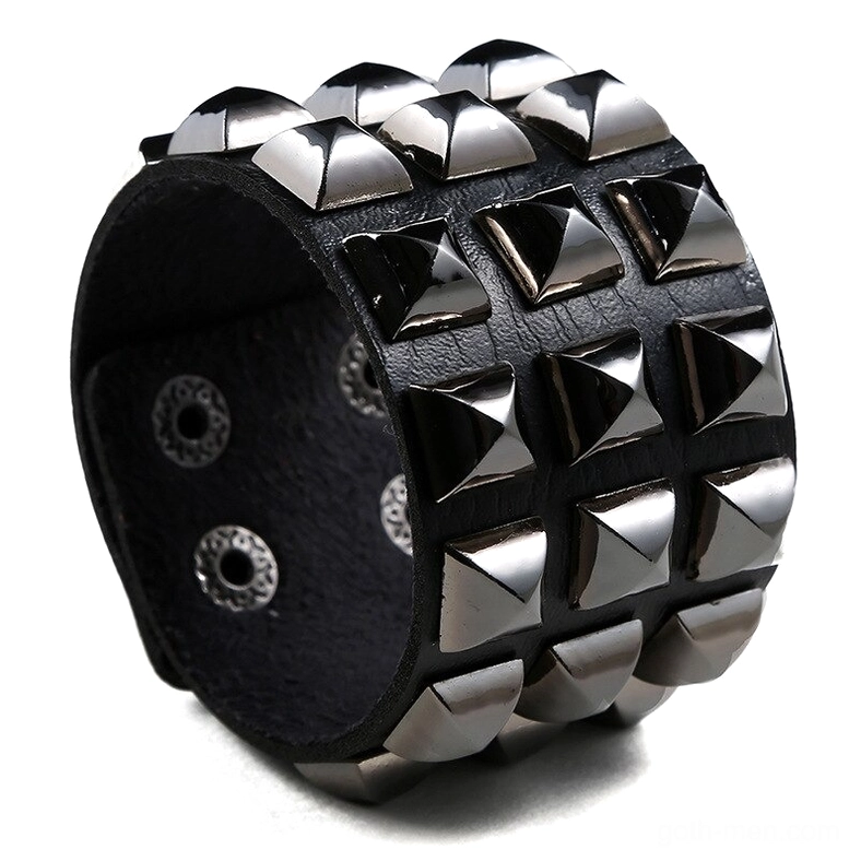 Black studded leather gothic cuff bracelet with silver pyramid studs and snap closure - front oblique view