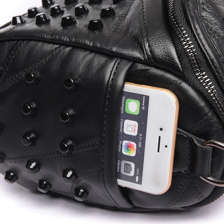 Black leather studded messenger crossbody bag detail view highlighting rivet placement and craftsmanship