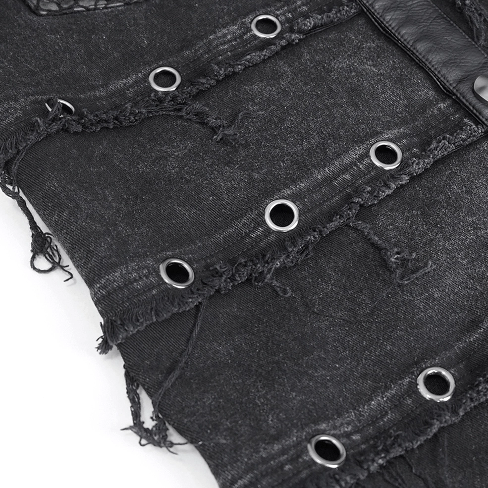 Black studded denim vest fabric texture - frayed edges and washed denim finish detail
