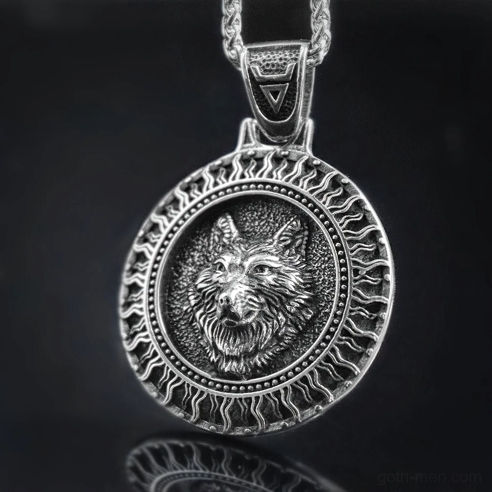 Black Sun Wolf Slavic amulet pendant close-up detail showing embossed wolf and sun ray frame with antique silver finish gothic aesthetics