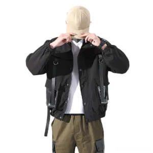 Black tactical cargo jacket with webbing straps and transparent patch pockets, front view on male model