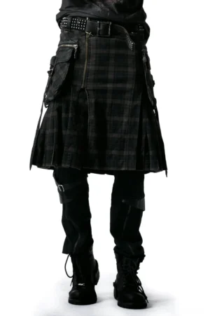 Black tartan cargo kilt front view worn by male model with detailed zipper and pleated design