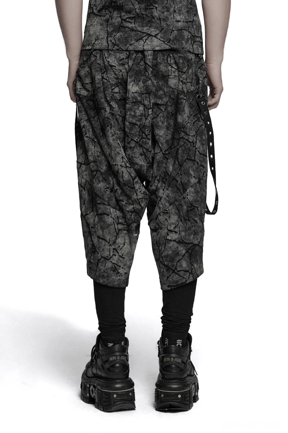 Black cracked tie-dye harem pants rear view displaying drop crotch cut and side eyelet strap details