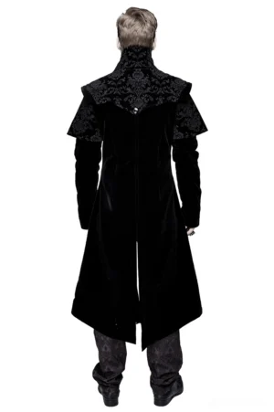 Black velvet gothic coat back view showing jacquard floral shoulder yoke and asymmetrical split hem design