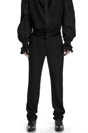 Black velvet embroidered gothic slim pants front view on male model showcasing fitted silhouette