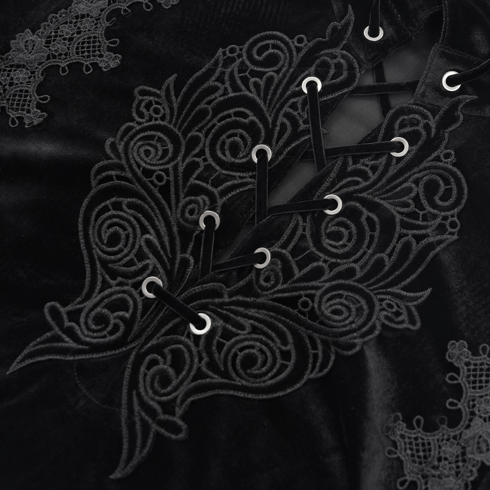 Close-up of black velvet gothic shirt scroll embroidery and lace-up front detail