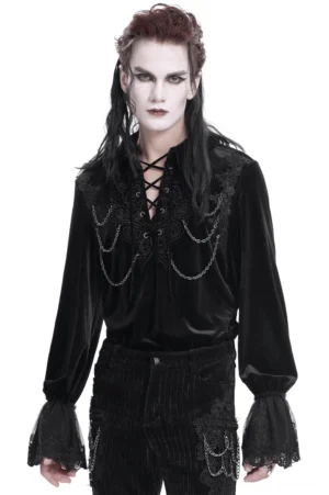Black velvet gothic shirt front view with ornate lace-up design and chain accents on male model
