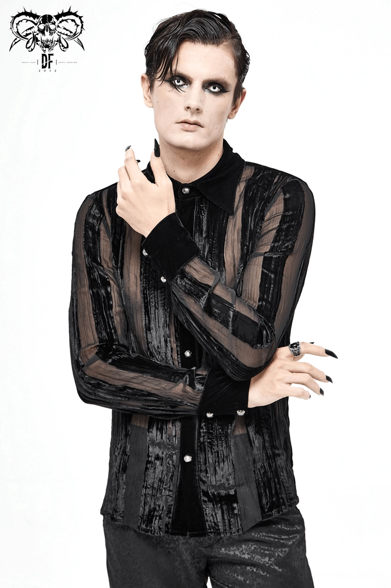 Three-quarter view of black velvet gothic shirt displaying overall silhouette and sheer panel placement